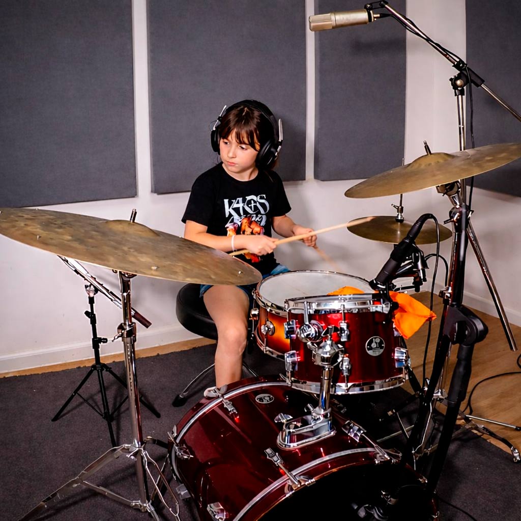 Alumno en clase de batería